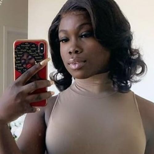 Une femme noire pour un plan Q